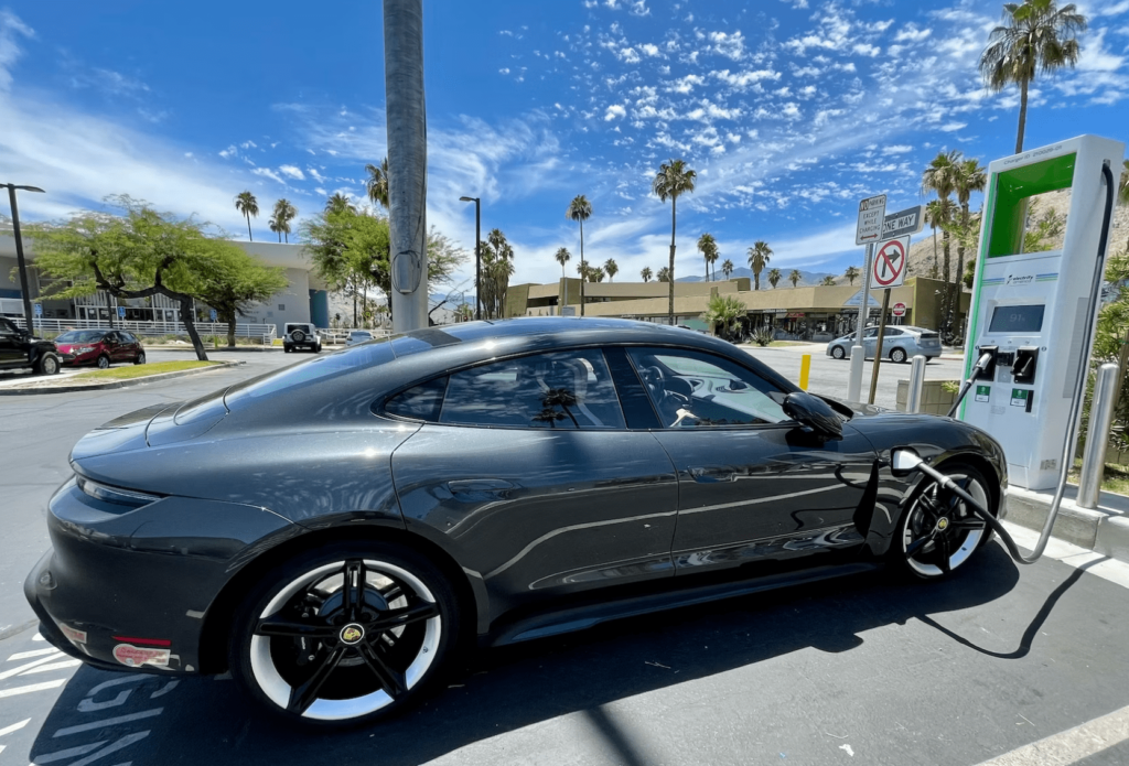 Electric Porsche at charging station -min