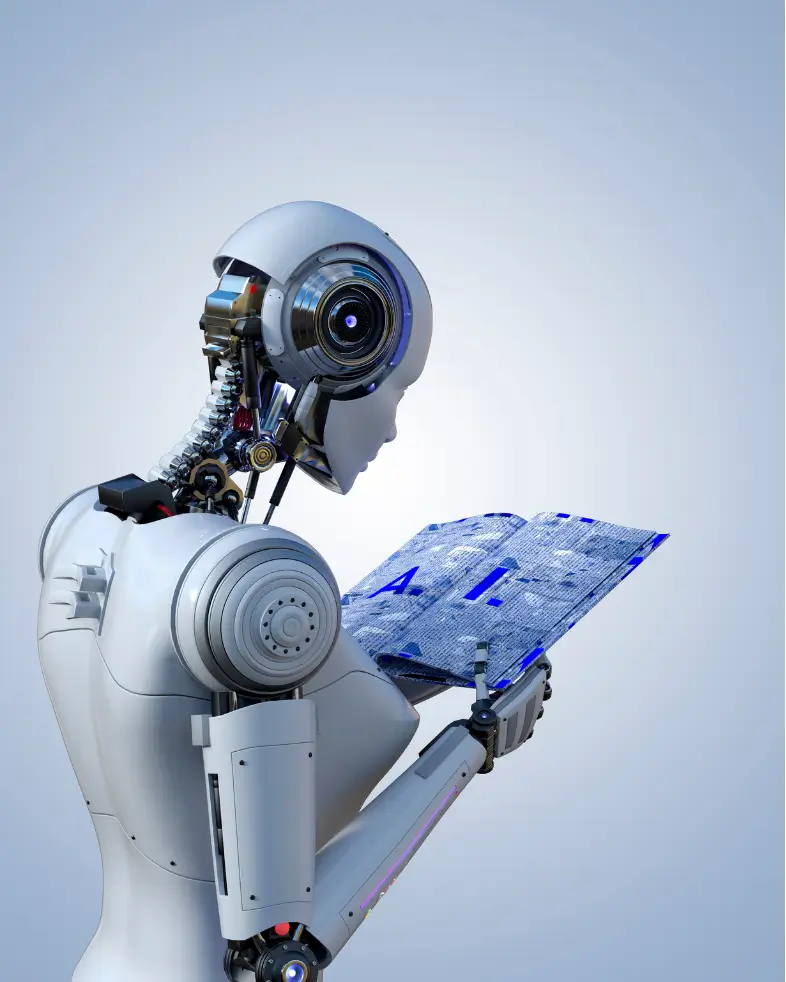 A realistic humanoid robot with exposed mechanical components, holding and reading a glowing futuristic book with "AI" text on its surface. The background is a gradient of light blue and white.